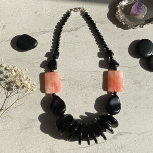 Black Beaded Necklace with Red-Orange Stone Accents