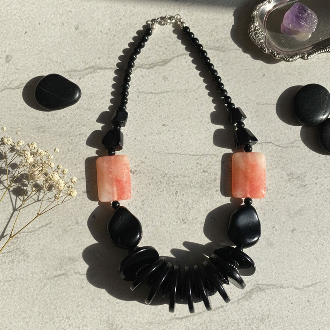 Black Beaded Necklace with Red-Orange Stone Accents