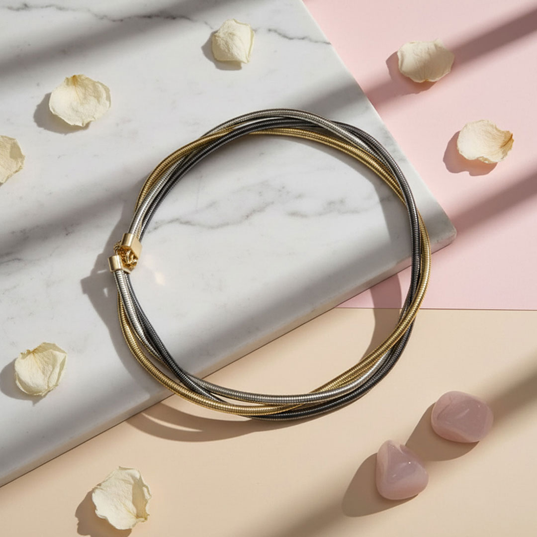 Multi-Tone Metal Coil Necklace in Gold, Silver, and Black