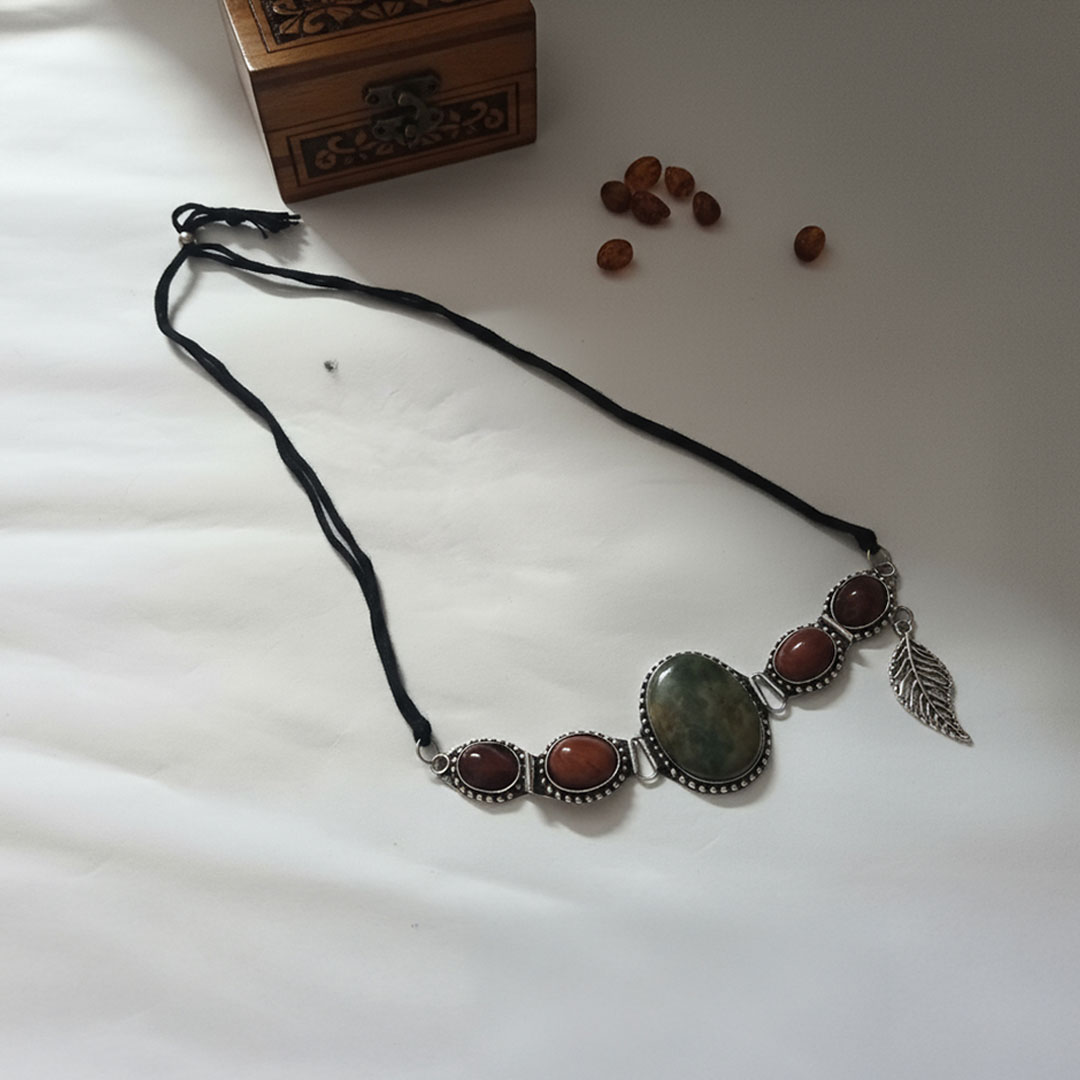 Silver Metal and Reddish Stone Black String Necklace