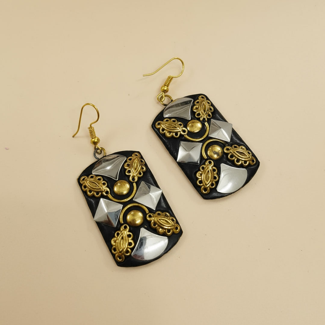 Black Resin Earrings with Gold and Silver-Tone Embellishments - Image 2