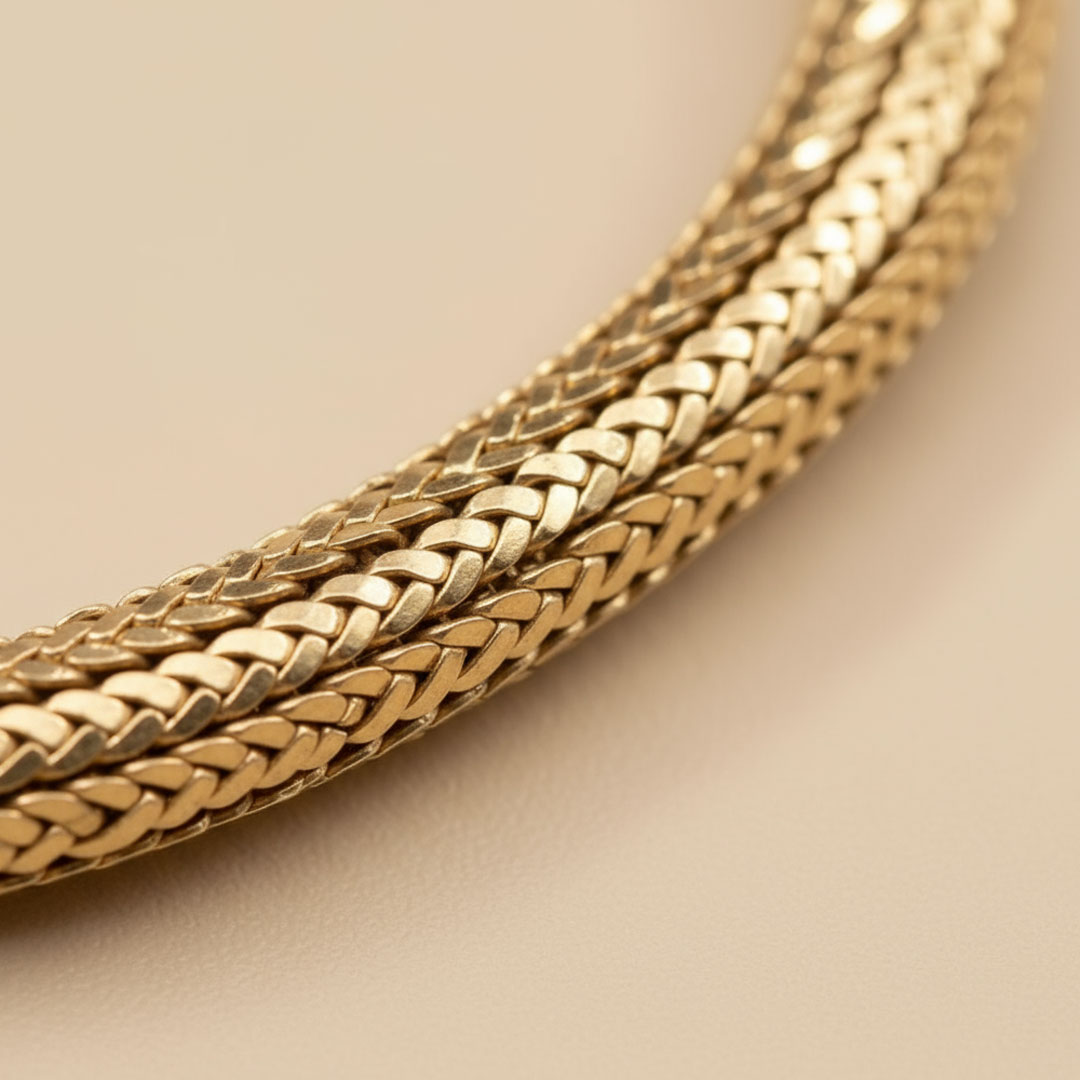 Gold-Plated Metal Bangle with Braided and Smooth Design - Image 4