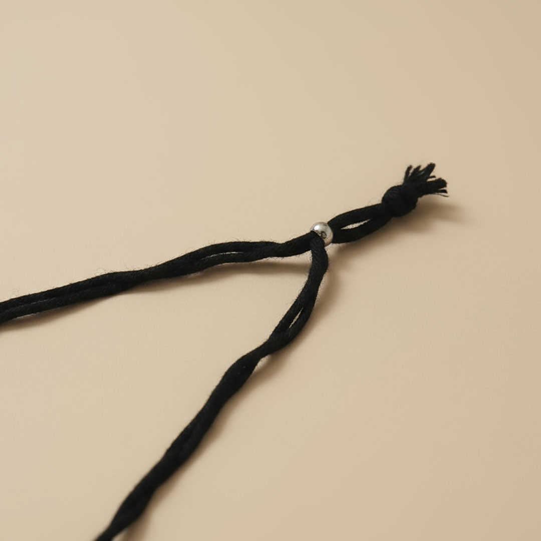 Silver Metal and Reddish Stone Black String Necklace - Image 3